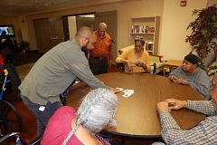 Card Collaboration: Residents win a dollar if they win the game